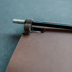 Pennhållare Klämma